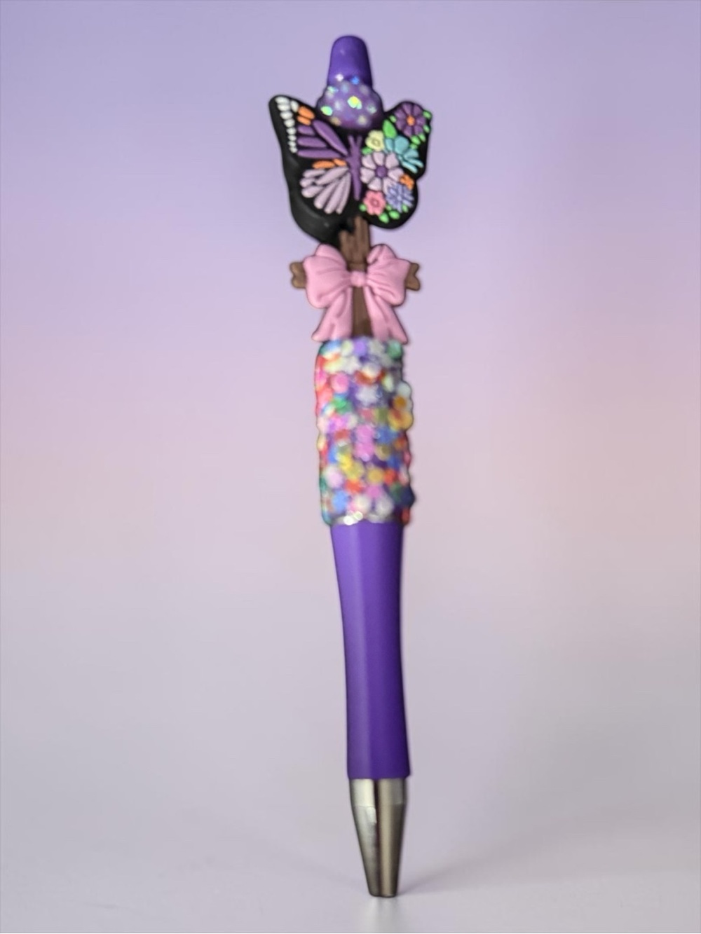Purple Butterfly Decorative Pen with Pink Bow and cross.